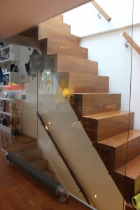 Oak staircase with glass flank wall