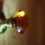 Amber glass faceted knob to bathroom door