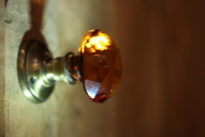 Amber glass faceted knob to bathroom door